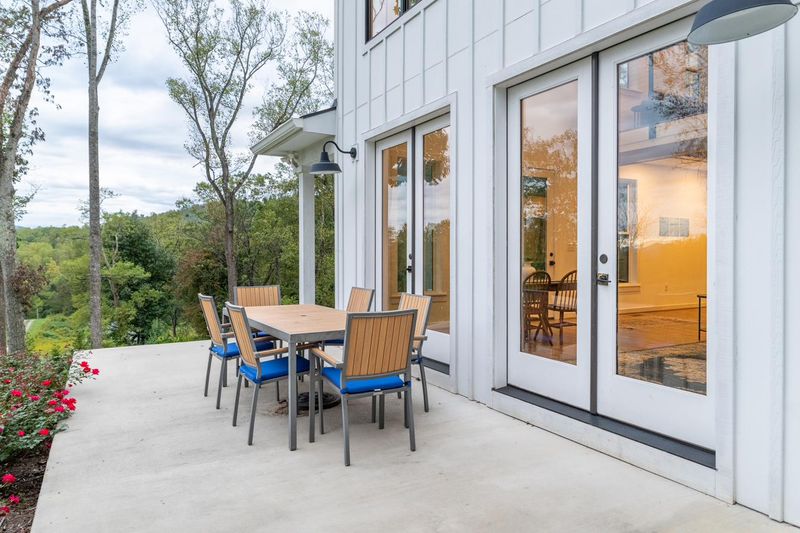 The patio dining table just outside the French doors